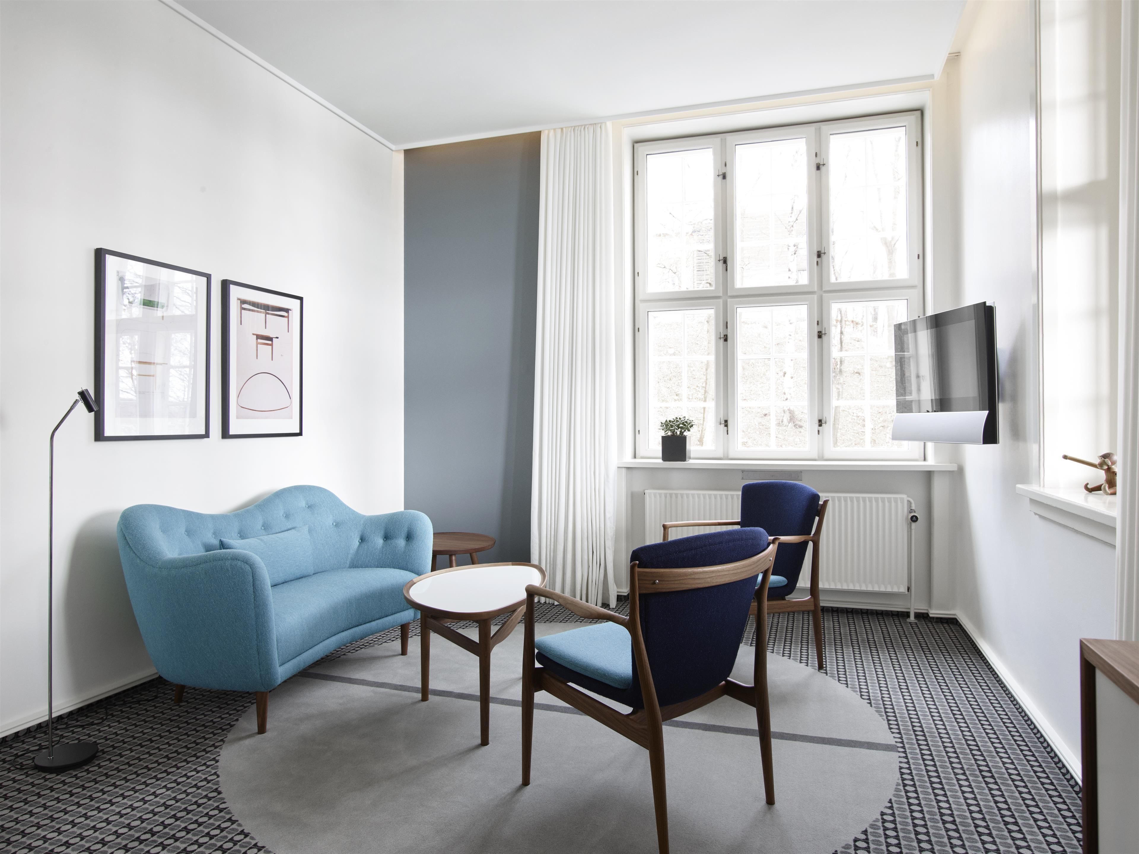 design suite, balcony, fjord view, main building | 1 bedroom, minibar, in-room safe, desk