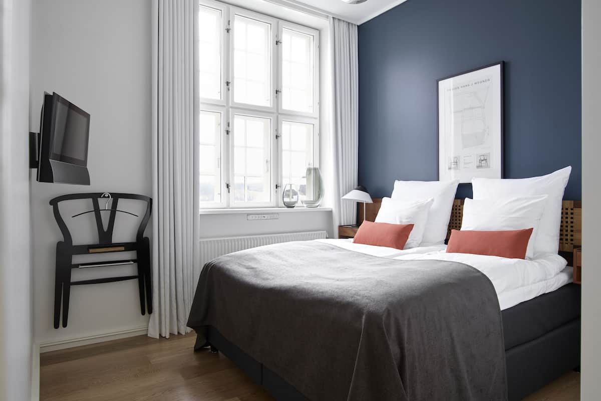 design suite, balcony, fjord view, main building | 1 bedroom, minibar, in-room safe, desk