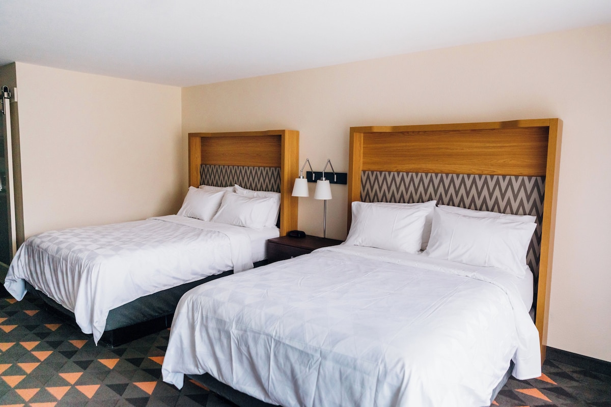 In-room safe, desk, iron/ironing board, cribs (free)