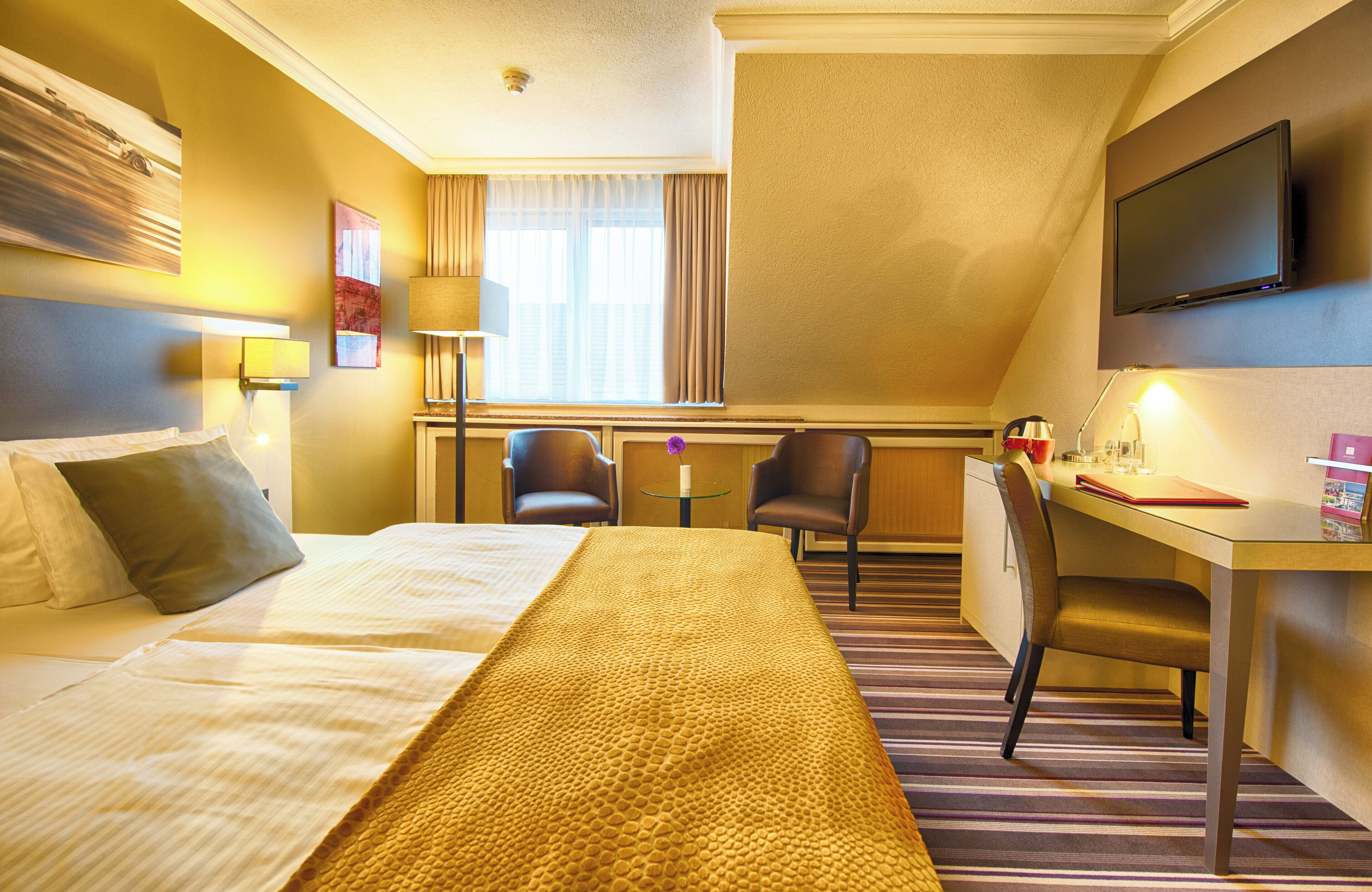 superior room | hypo-allergenic bedding, in-room safe, desk, free cots/infant beds