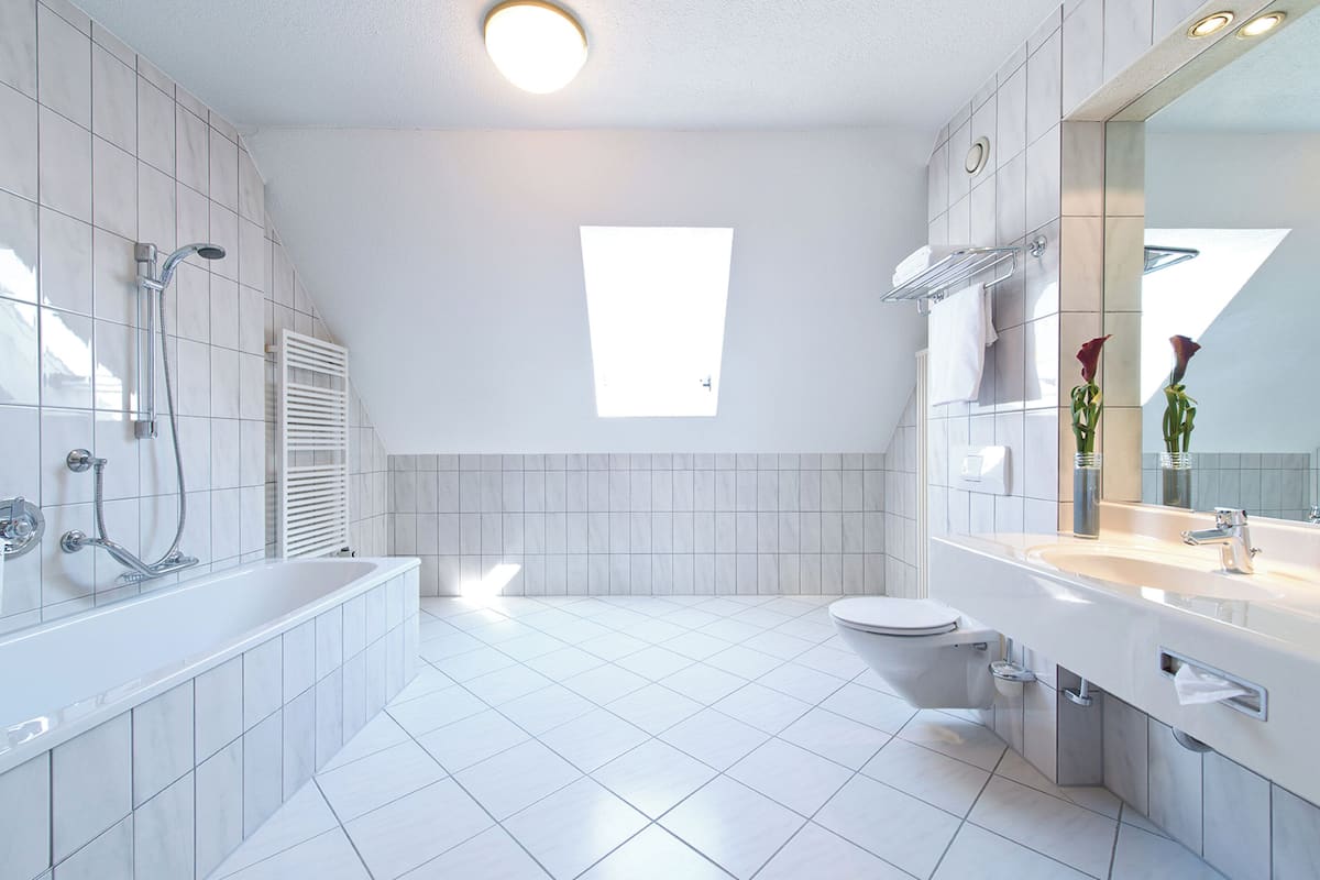 family room | bathroom | combined shower/bathtub, hair dryer, towels