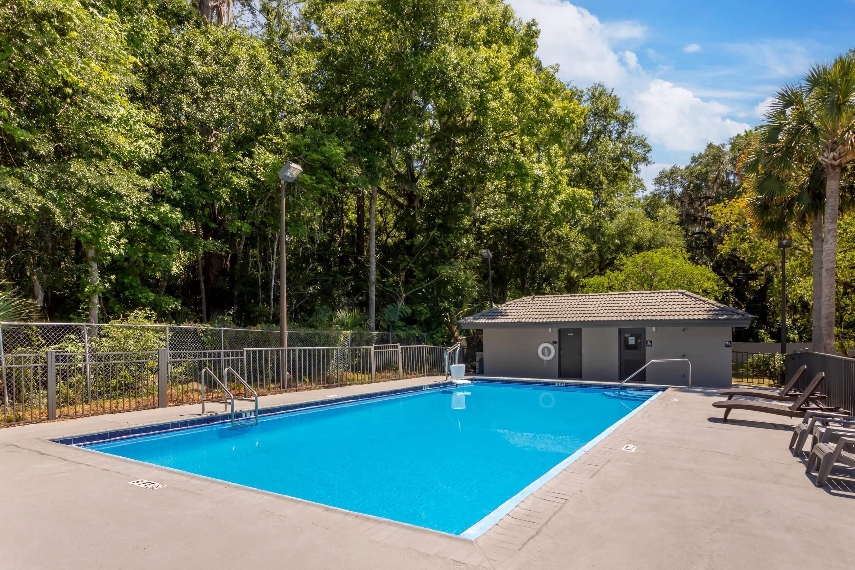 Outdoor pool, open 8:00 AM to 10:00 PM, pool umbrellas