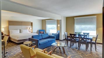Suite, 1 Bedroom, Courtyard View | Desk, laptop workspace, blackout drapes, iron/ironing board