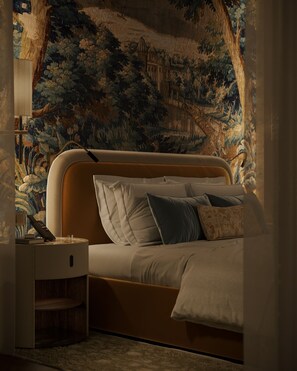 A bedroom with a bed, pillows, a bedside table, and a lamp. - Palazzo Monnalisa (Florence)