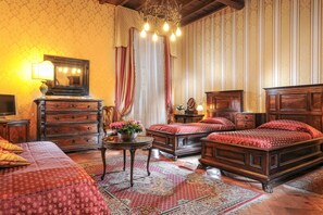 Classic Triple Room, 1 Bedroom | Minibar, in-room safe, individually decorated, individually furnished