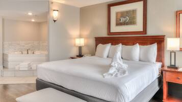 King Bed Mini-Suite with Jacuzzi & Fireplace | Egyptian cotton sheets, premium bedding, pillowtop beds, desk