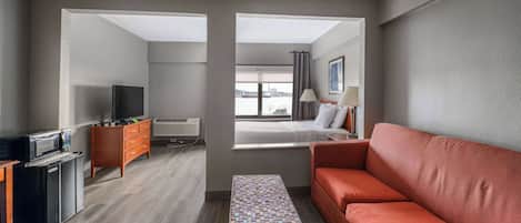 Deluxe Room, 1 Queen Bed, Non Smoking | Premium bedding, desk, laptop workspace, iron/ironing board