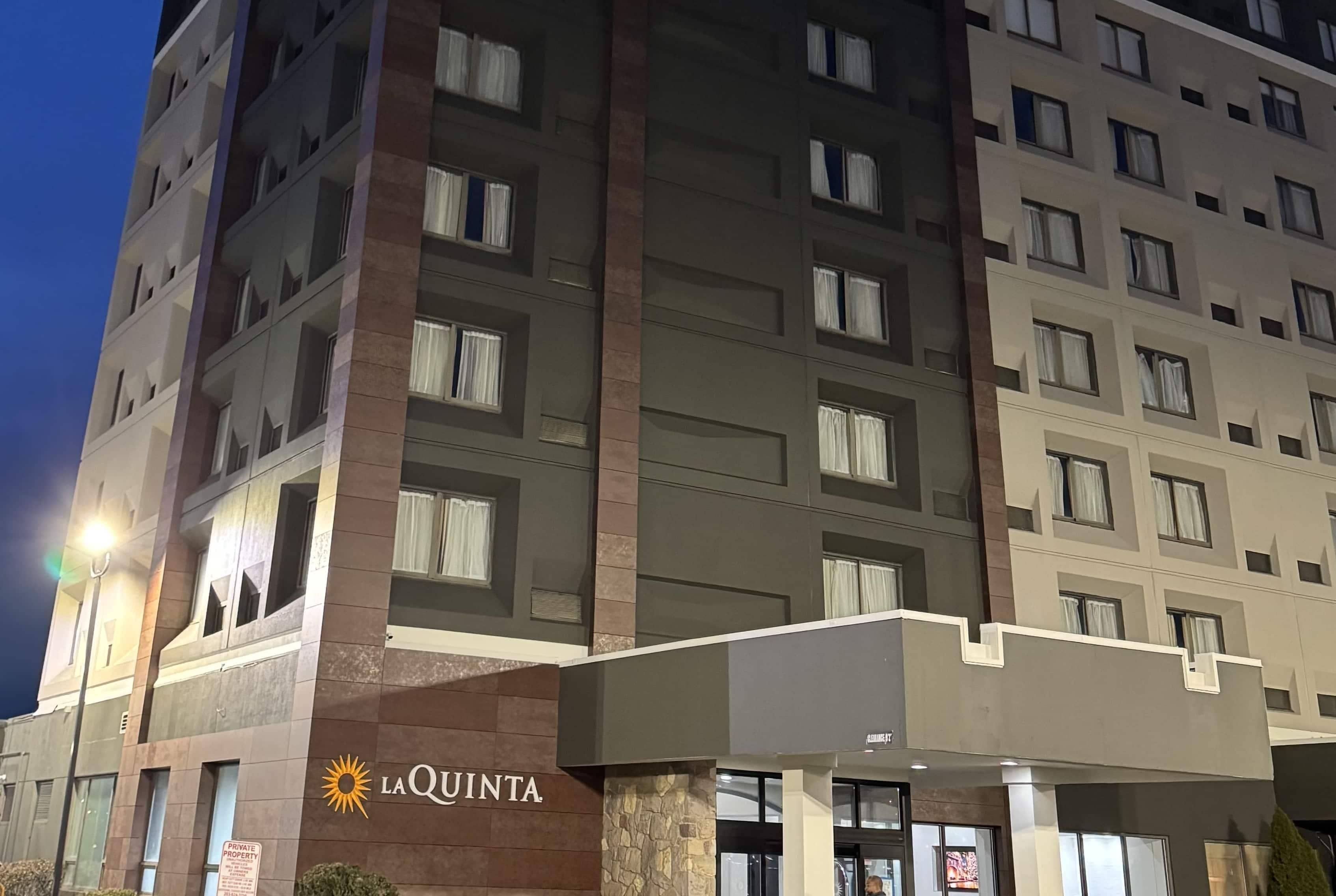 A multi-story hotel with a prominent 'La Quinta' sign, indicating the property name.