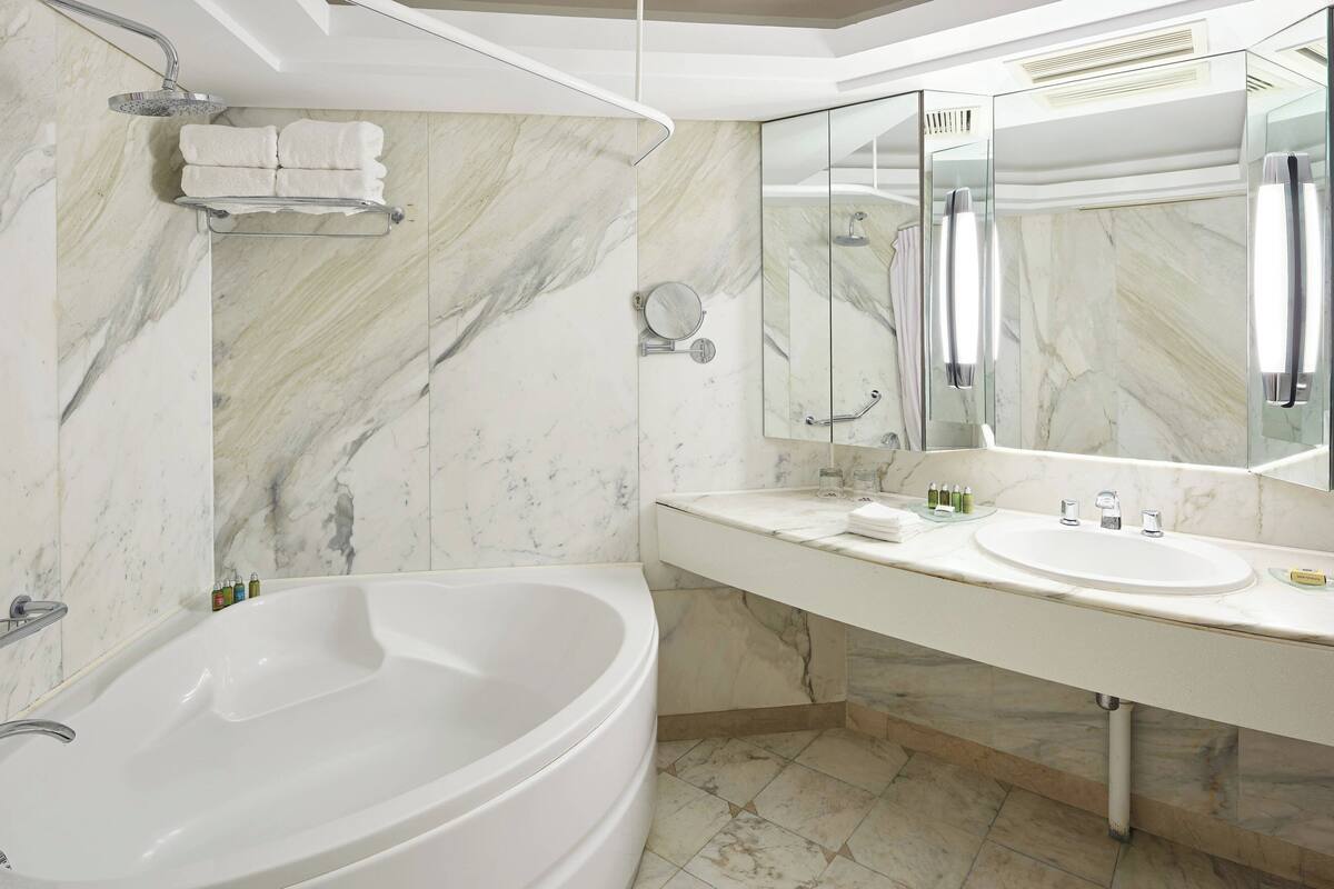 rainfall showerhead, eco-friendly toiletries, hair dryer, bathrobes