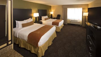 Premium bedding, desk, laptop workspace, blackout curtains