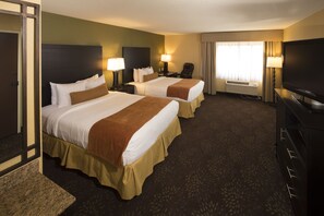 Premium bedding, desk, laptop workspace, blackout curtains