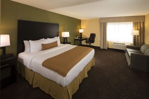 Premium bedding, desk, laptop workspace, blackout curtains