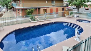 Seasonal outdoor pool, pool loungers