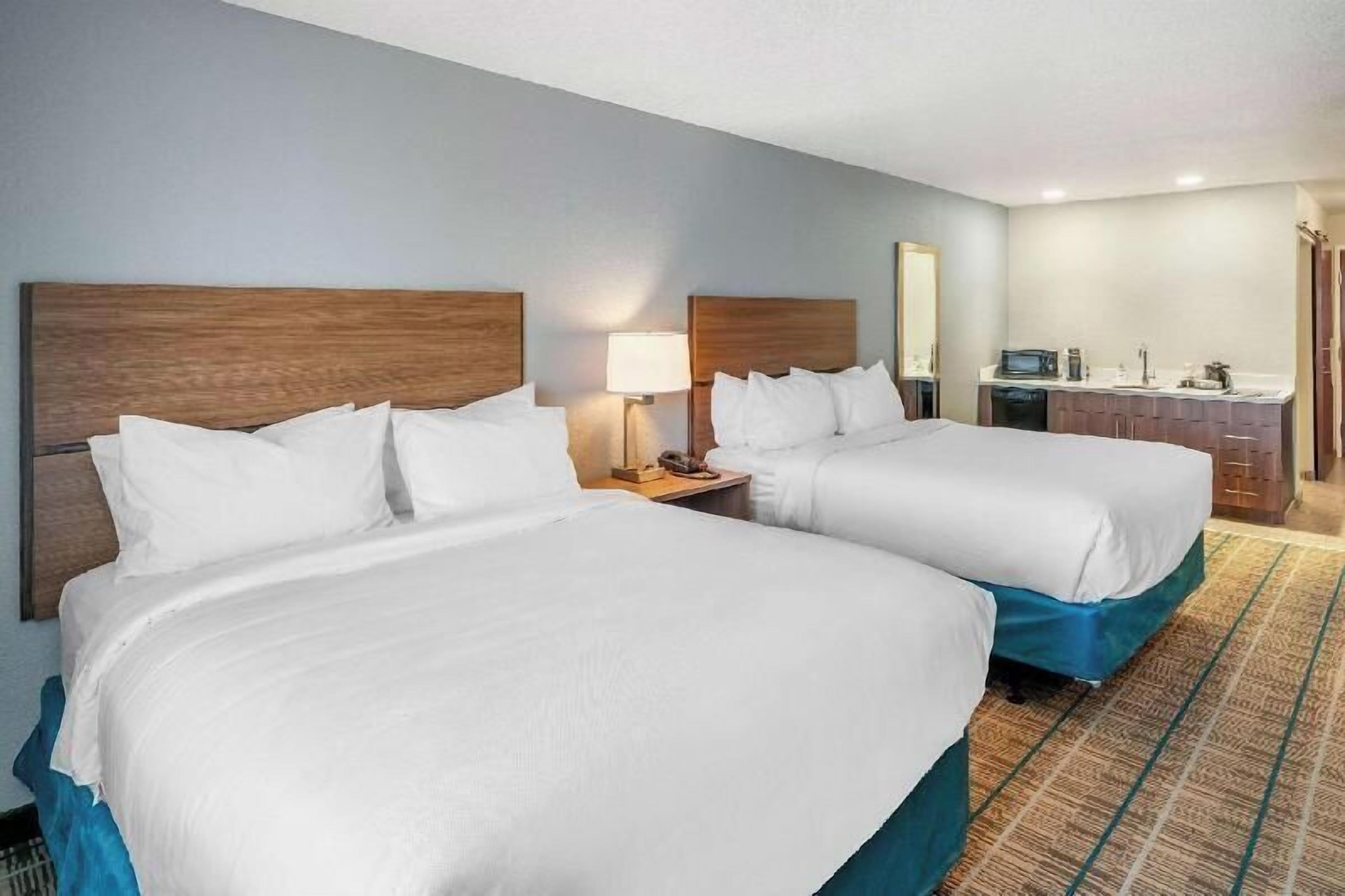 Premium bedding, pillowtop beds, desk, laptop workspace