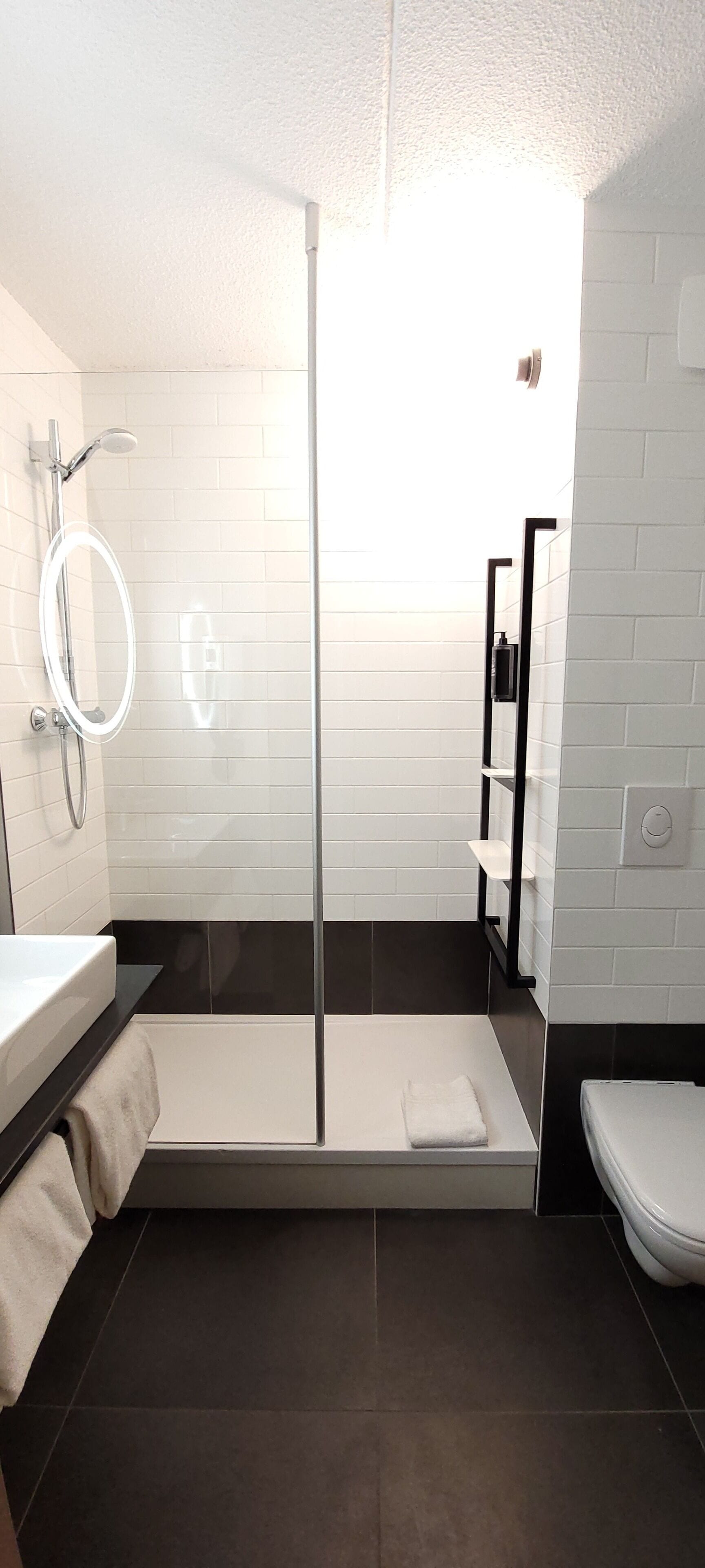 Shower, eco-friendly toiletries, hair dryer, towels