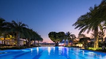 Outdoor pool, pool umbrellas, sun loungers