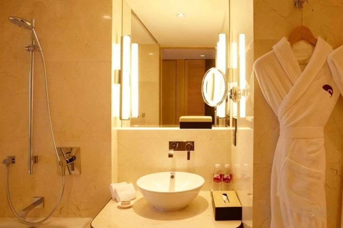 Bathroom | Designer toiletries, hair dryer, bathrobes, slippers