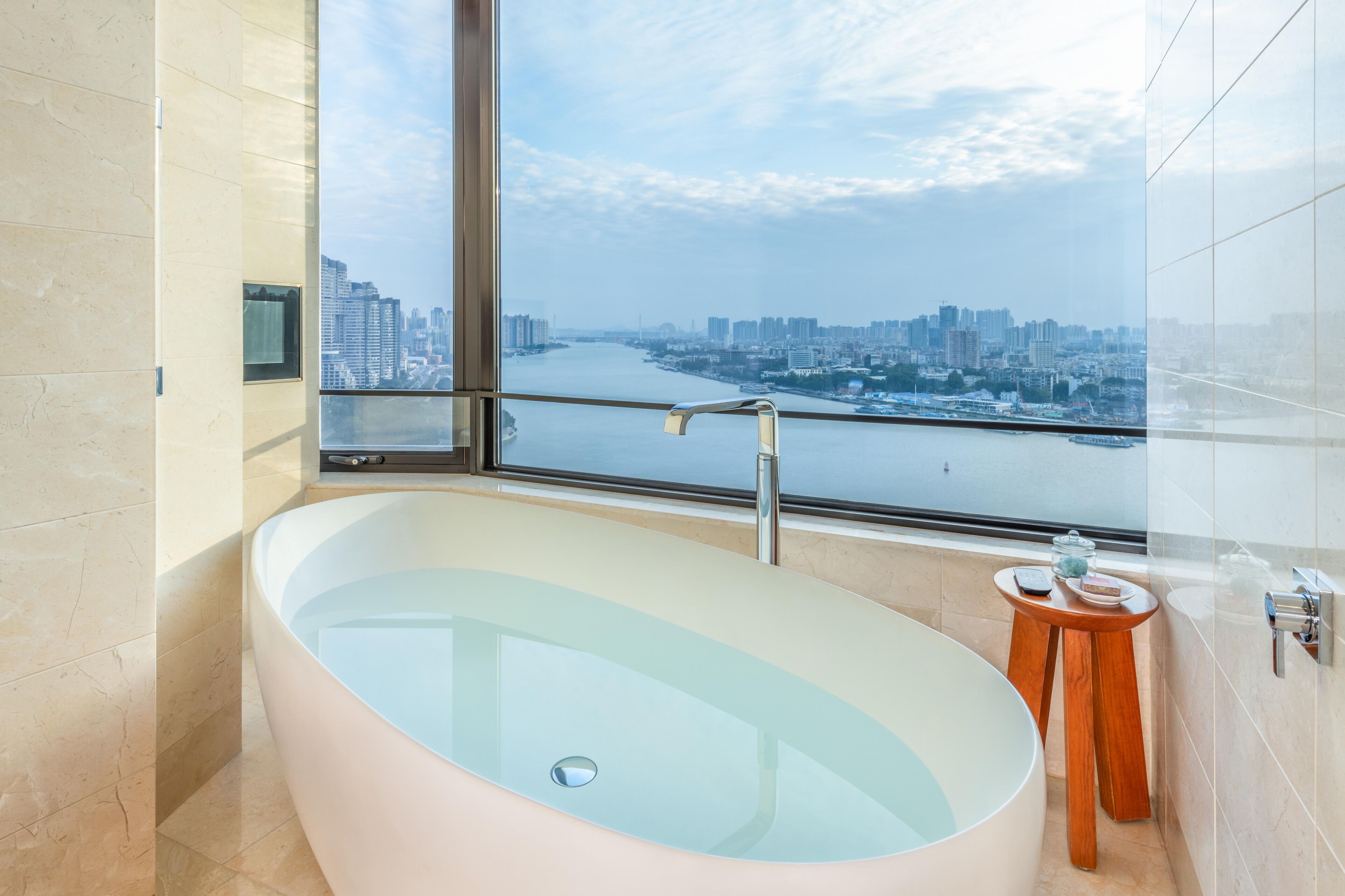 designer toiletries, hair dryer, bathrobes, slippers