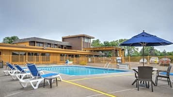 Seasonal outdoor pool, open 10 AM to 10 PM, pool loungers