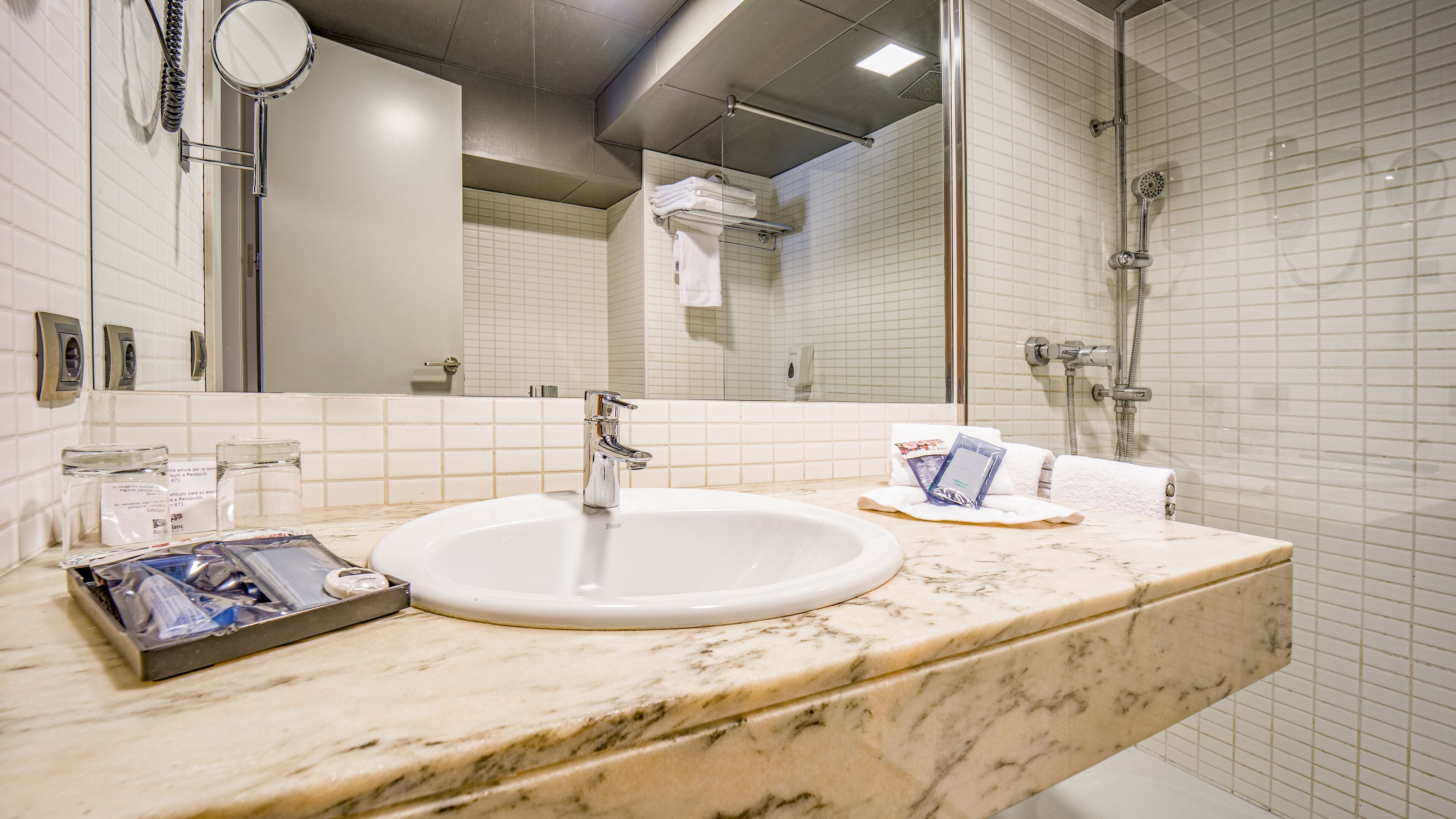 eco-friendly toiletries, hair dryer, bathrobes, slippers