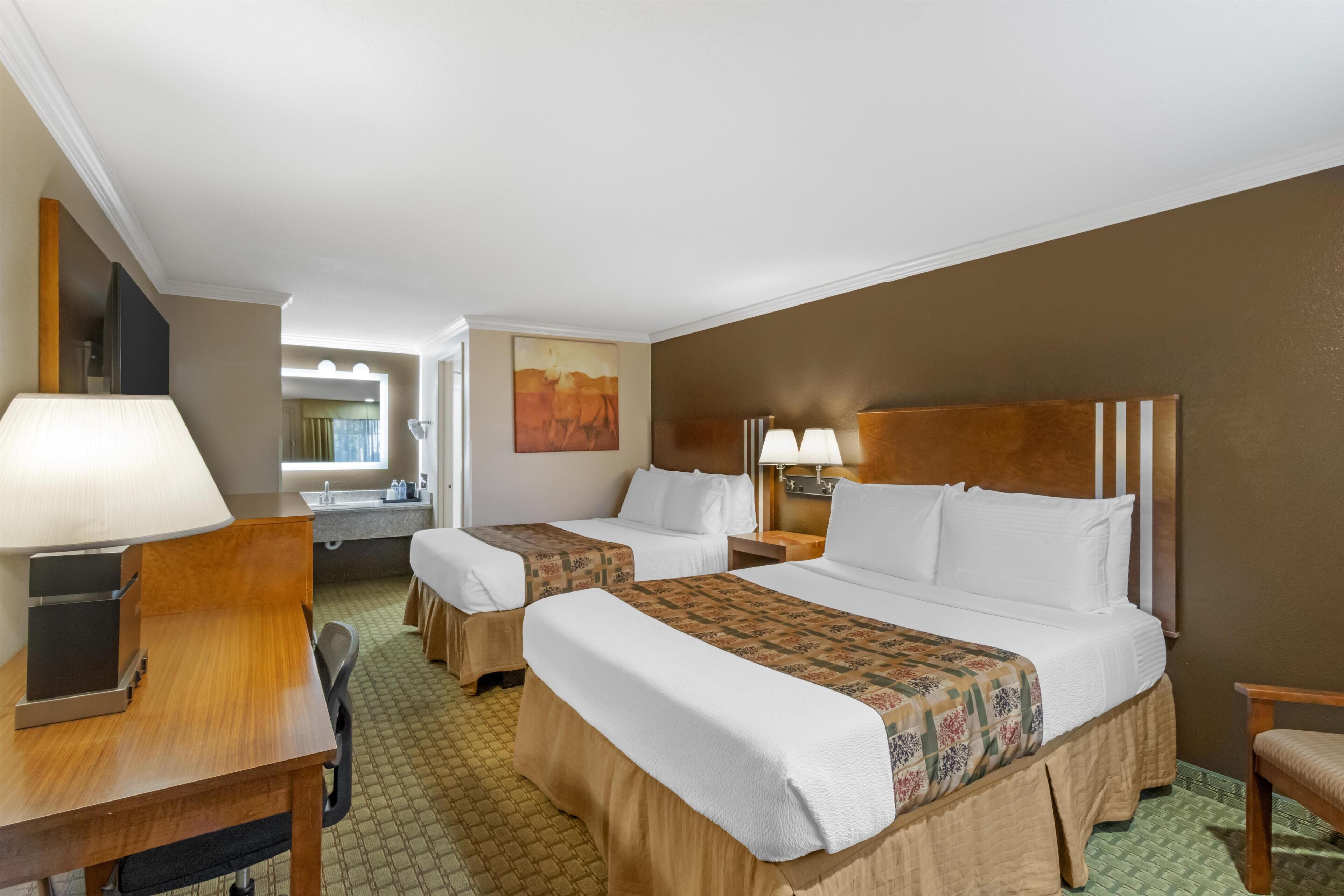Tempur-Pedic beds, desk, blackout drapes, soundproofing