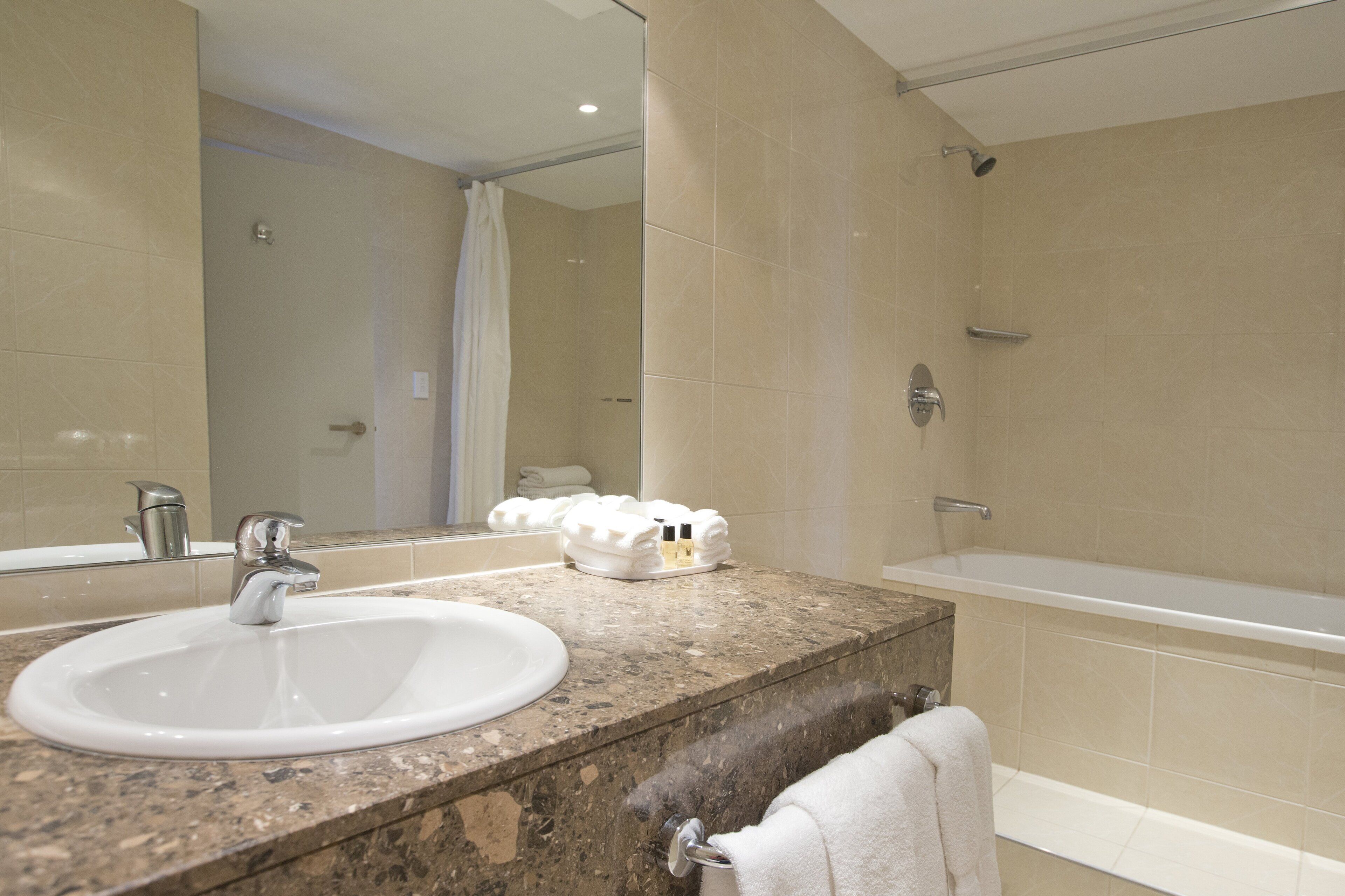junior suite | bathroom | eco-friendly toiletries, hair dryer, towels, soap
