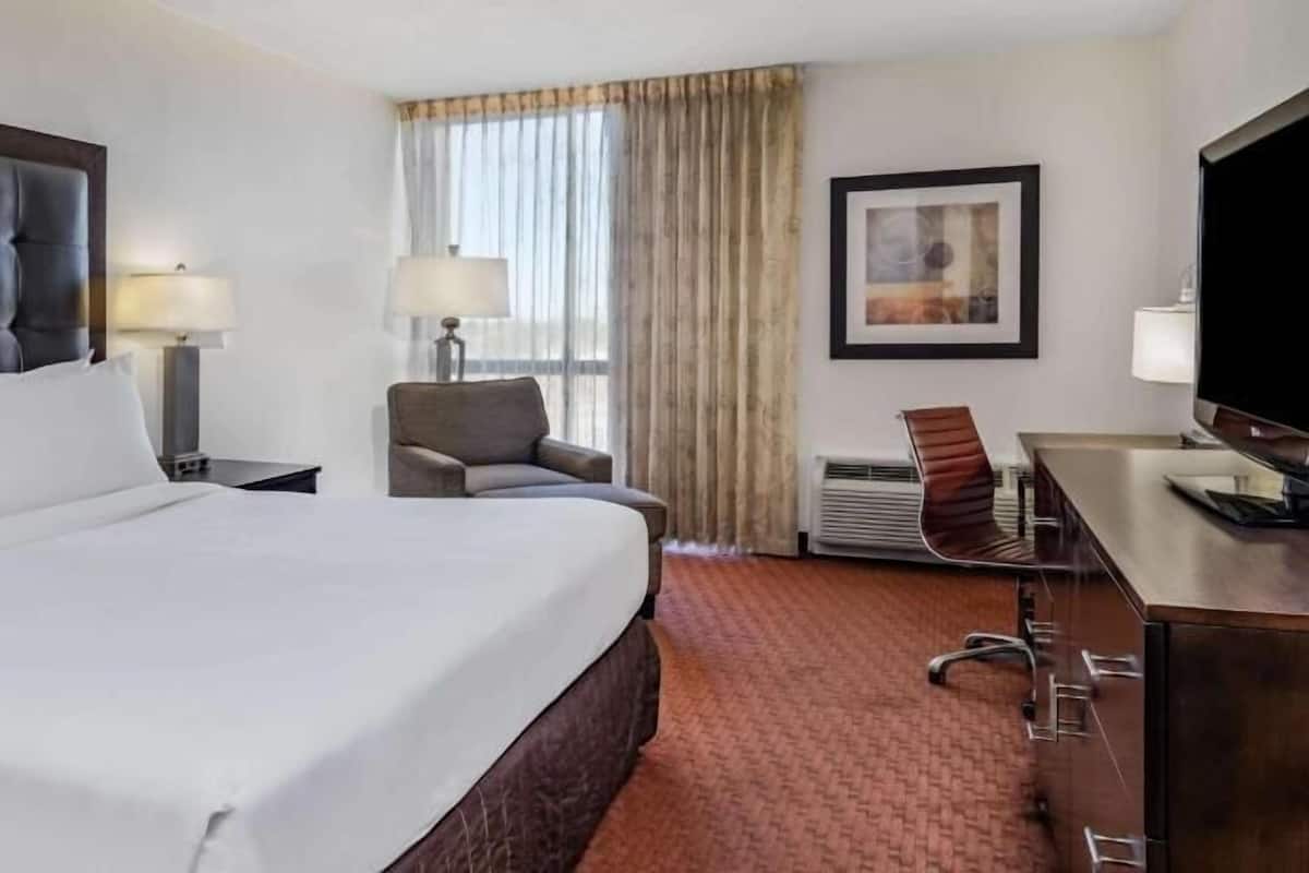 Desk, laptop workspace, blackout curtains, iron/ironing board