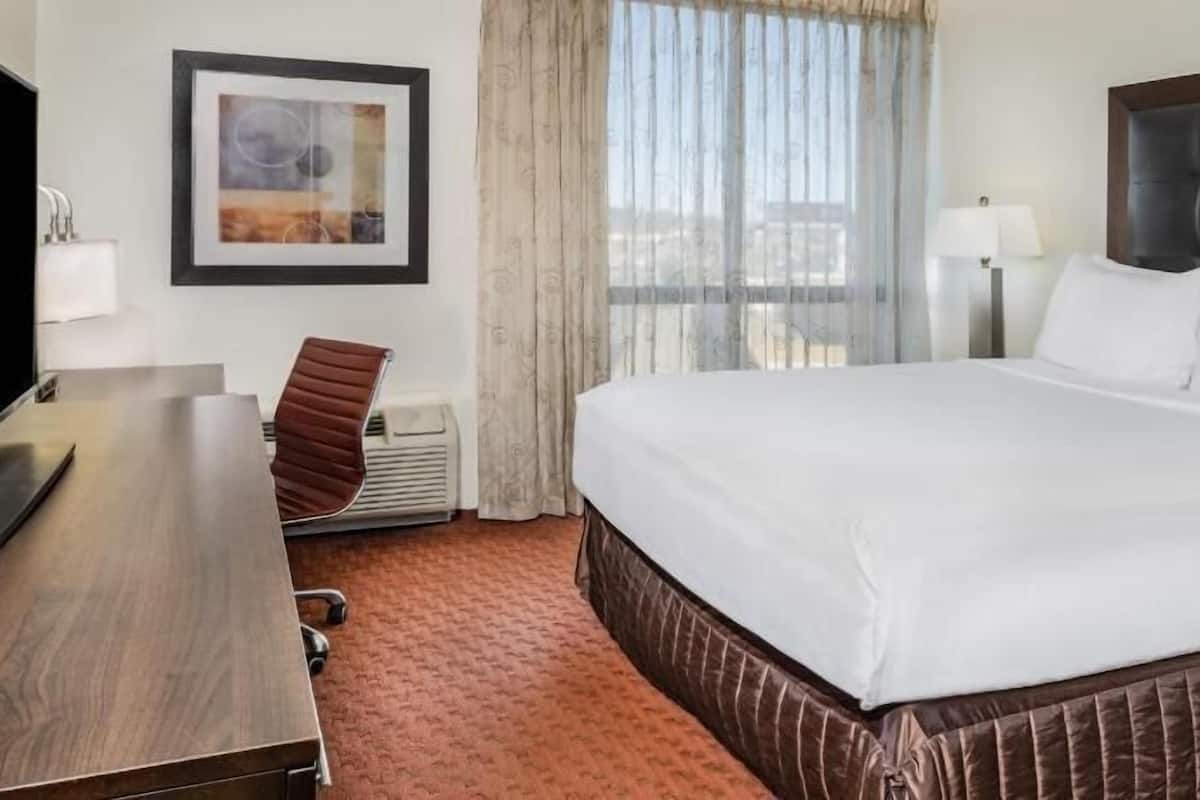 Desk, laptop workspace, blackout curtains, iron/ironing board