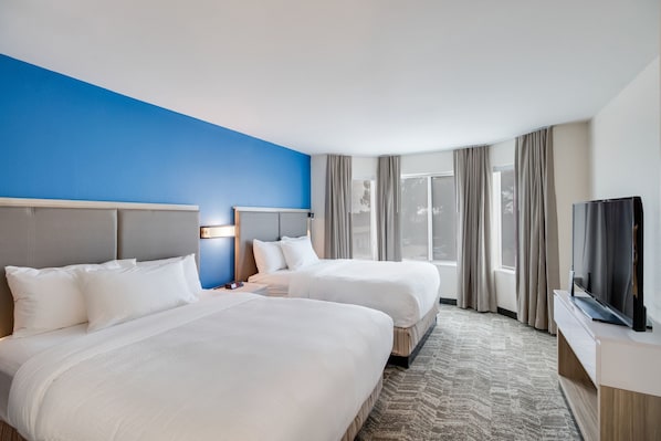 Suite, Multiple Beds | Hypo-allergenic bedding, desk, blackout curtains, iron/ironing board