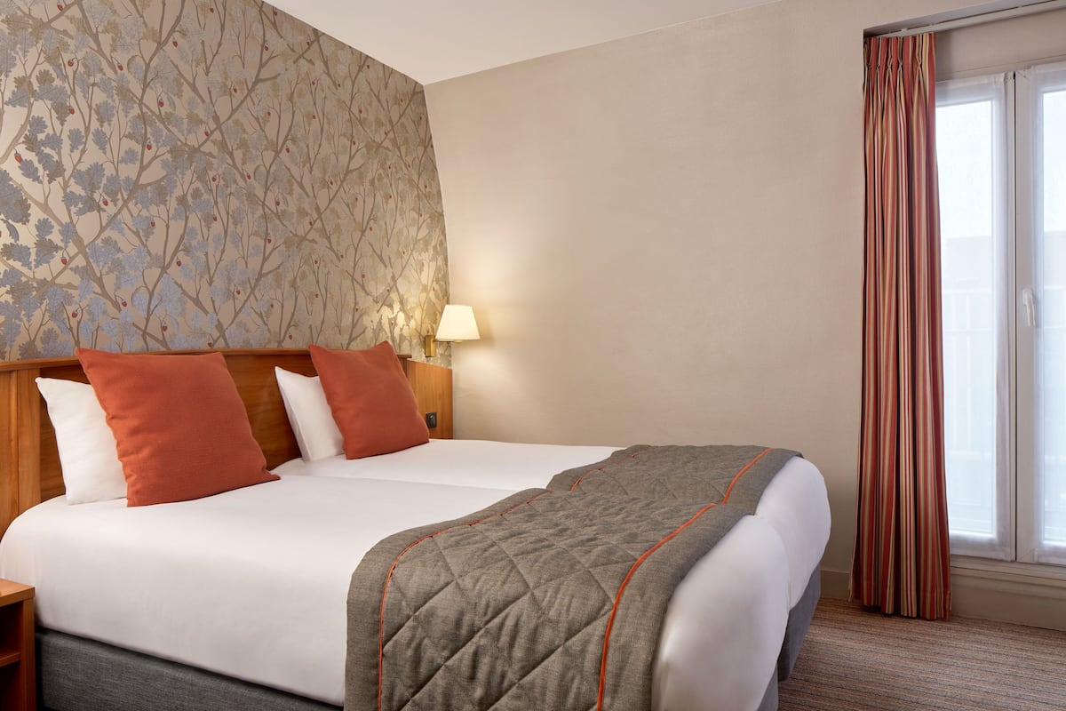 Twin Room | Desk, iron/ironing board, free cots/infant beds, free WiFi