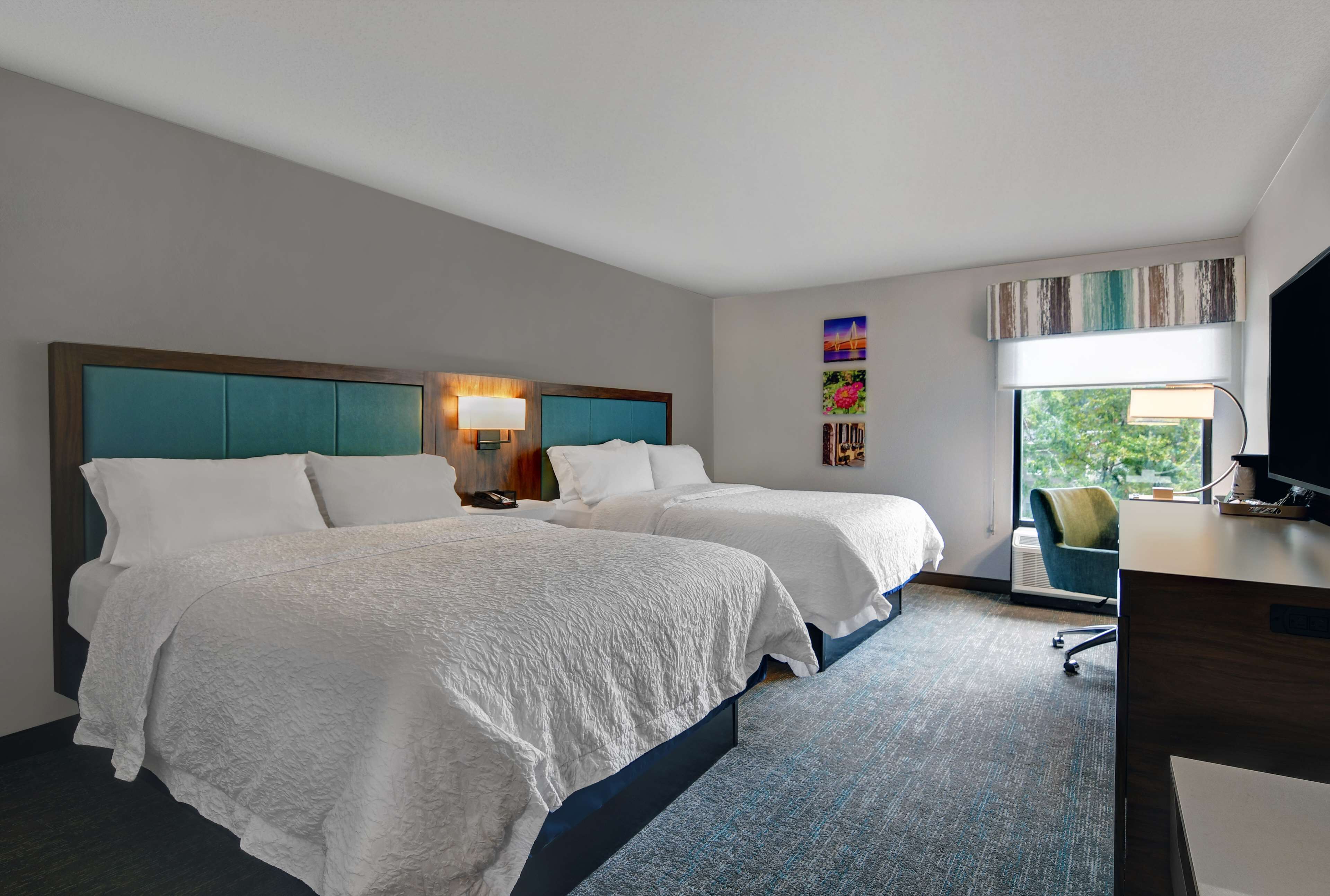 room, 2 queen beds, non smoking | in-room safe, iron/ironing board, free cots/infant beds, free wifi