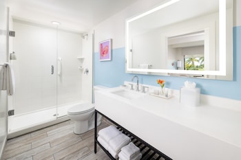 Designer toiletries, hair dryer, bathrobes, towels at The Gates Hotel Key West Newly Renovated