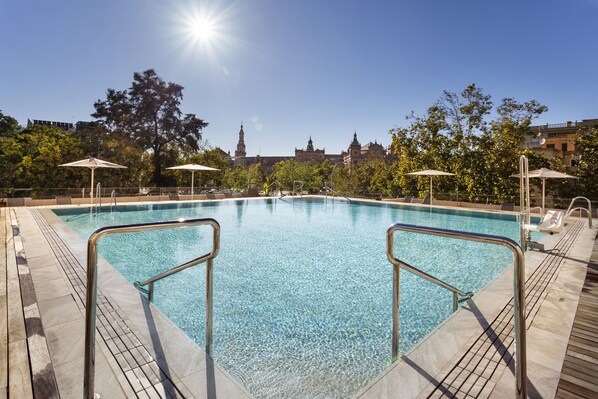Outdoor pool, pool umbrellas, pool loungers