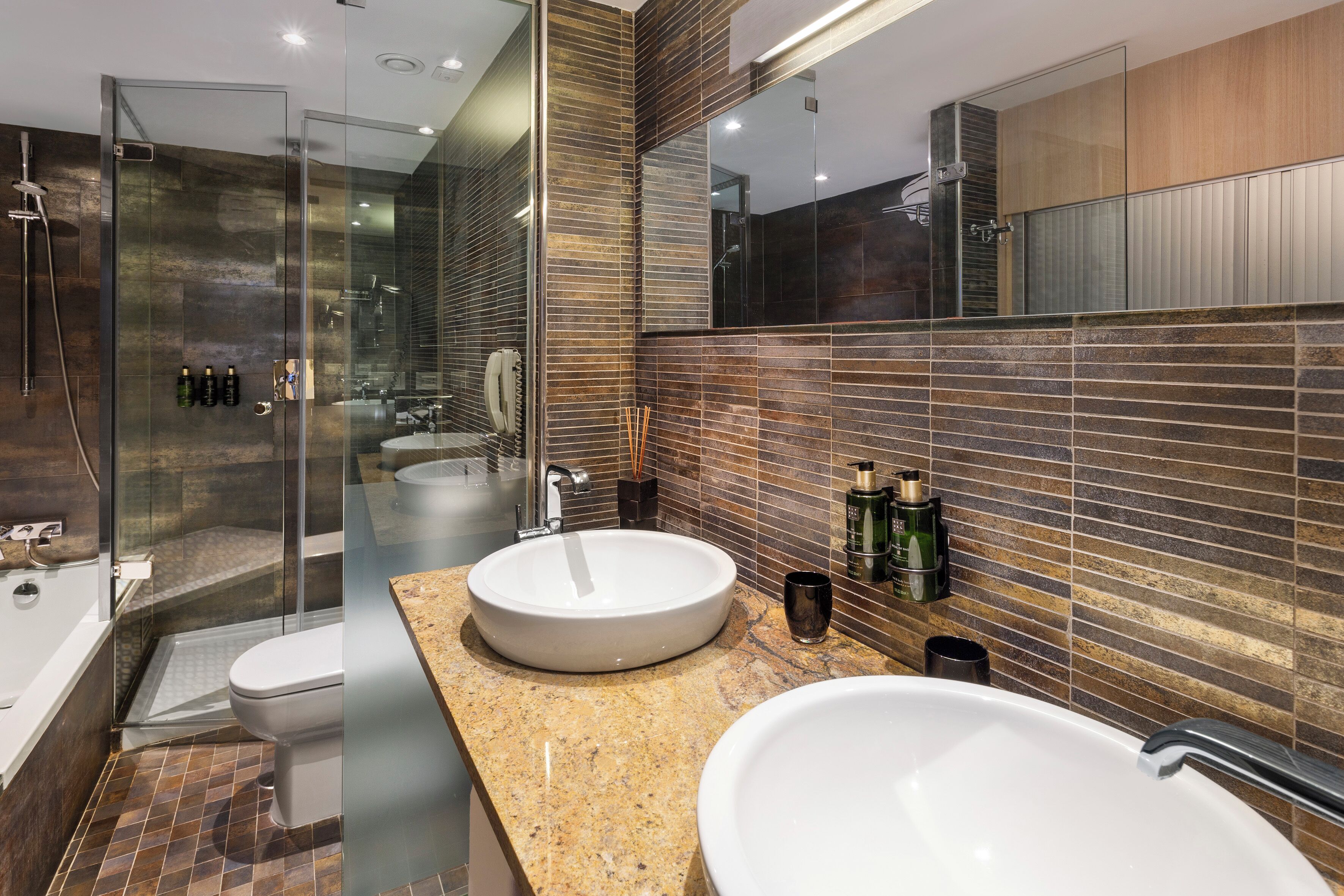 eco-friendly toiletries, hair dryer, towels, soap