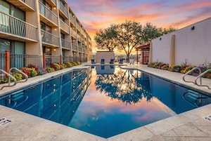 Outdoor pool, open 7:00 AM to 11:00 PM, sun loungers