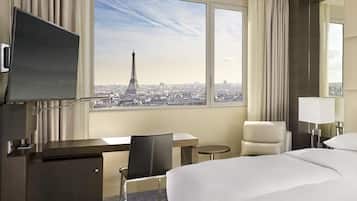 2 twin beds with Eiffel Tower View | Premium bedding, in-room safe, desk, blackout drapes