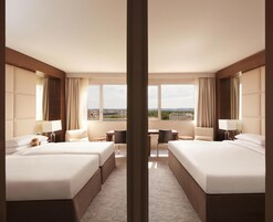Family Room | Premium bedding, in-room safe, desk, blackout drapes