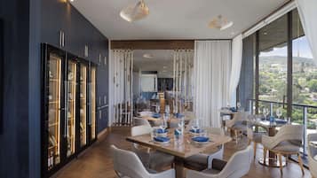 Breakfast, lunch, dinner served; sea views