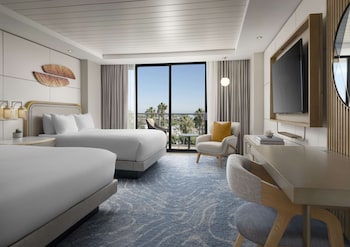 In-room safe, desk, laptop workspace, blackout drapes at Hotel La Jolla, Curio Collection by Hilton