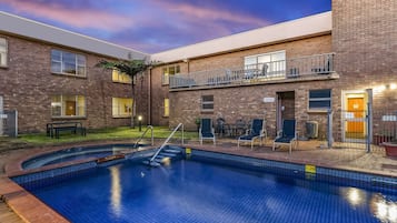 Outdoor pool, free pool cabanas, pool umbrellas