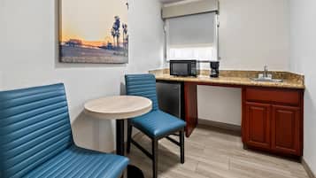 Standard Room, 1 King Bed, Refrigerator & Microwave, Courtyard Area | Pillowtop beds, desk, laptop workspace, blackout drapes