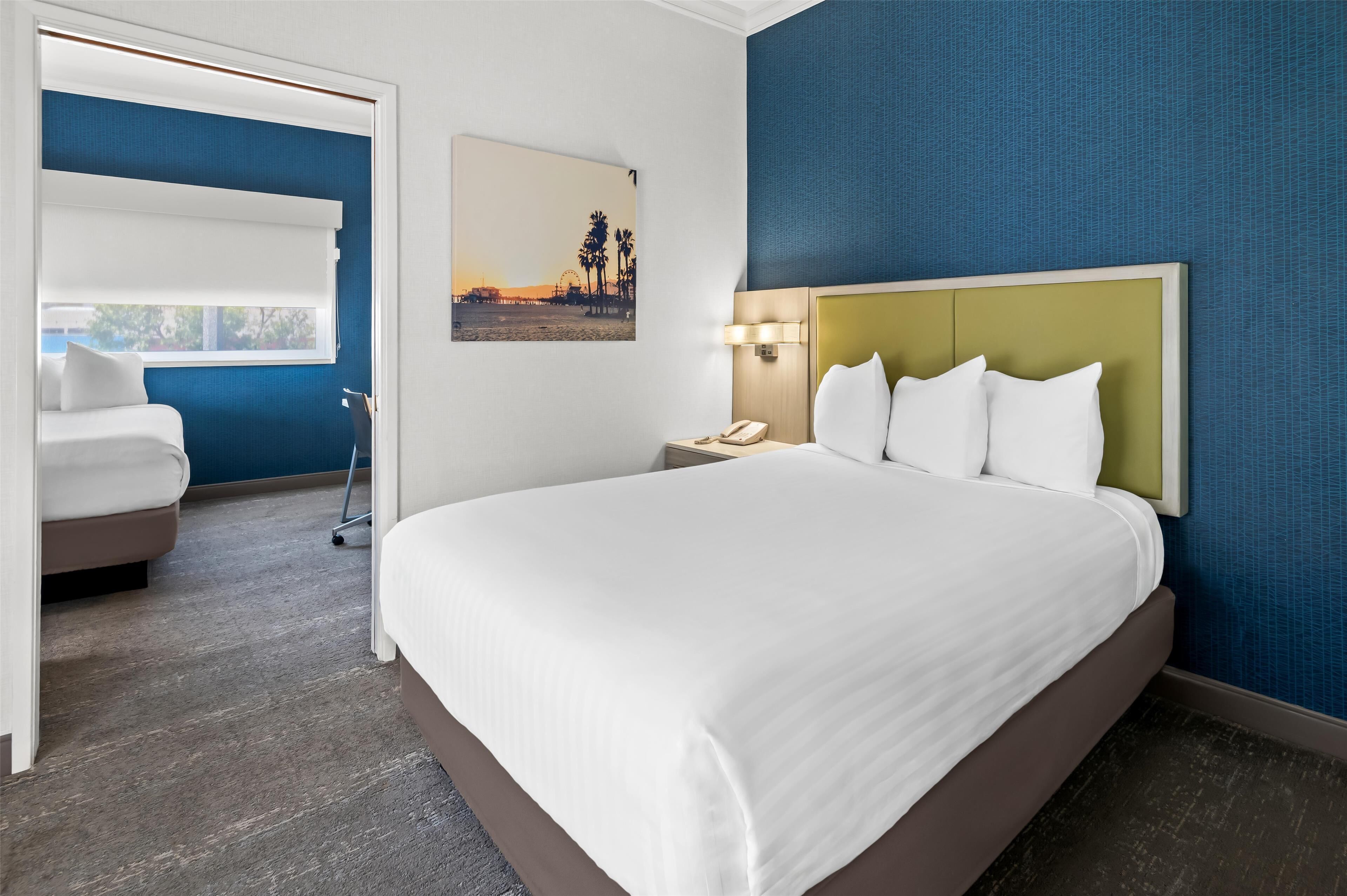 Suite, 2 Double Beds, Non Smoking, Refrigerator & Microwave | Pillowtop beds, desk, laptop workspace, blackout drapes