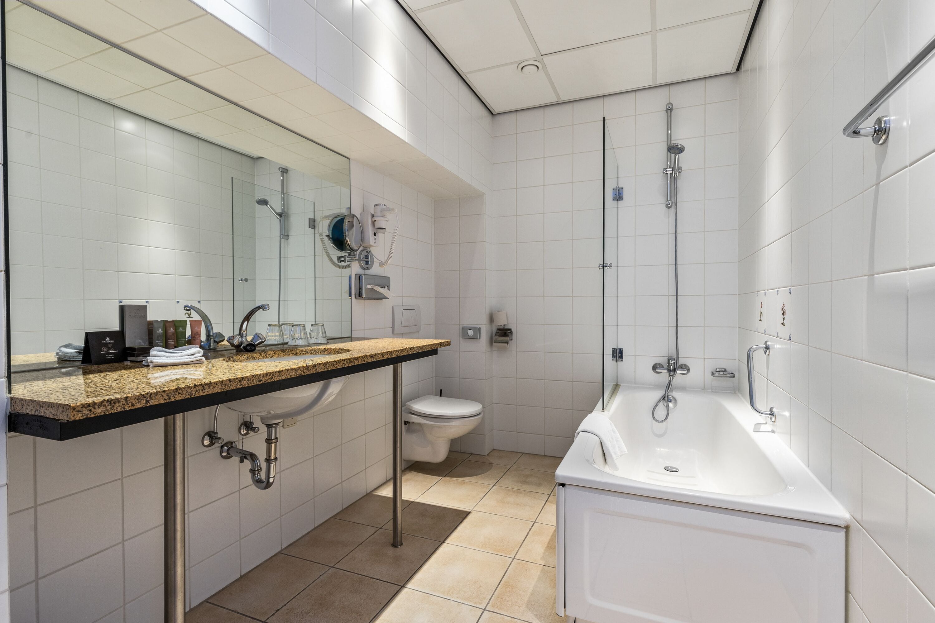 eco-friendly toiletries, hair dryer, bathrobes, slippers