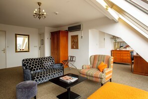 Suite, 1 King Bed, City View | 1 bedroom, hypo-allergenic bedding, minibar, in-room safe