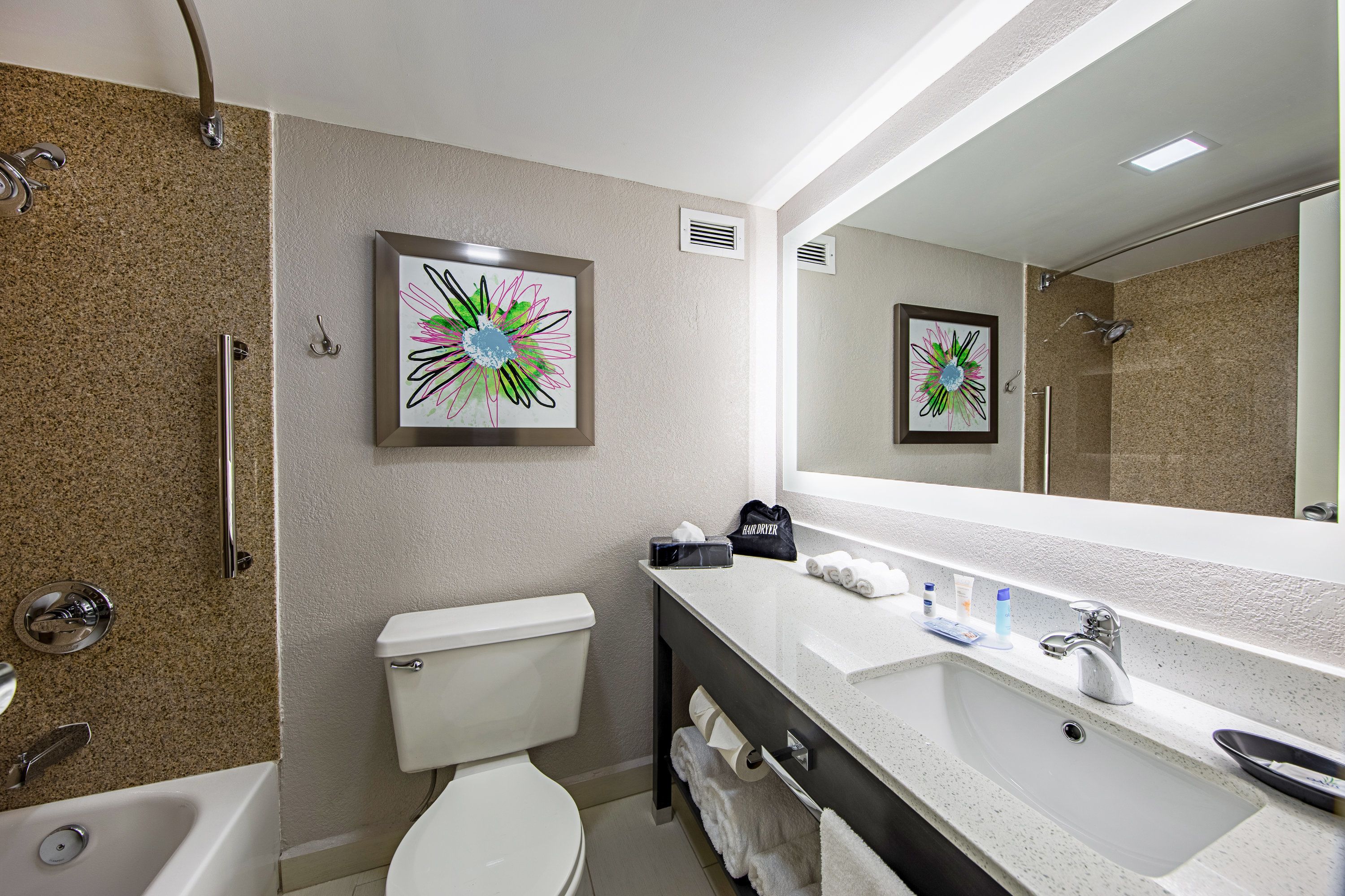 combined shower/bathtub, eco-friendly toiletries, hair dryer, towels