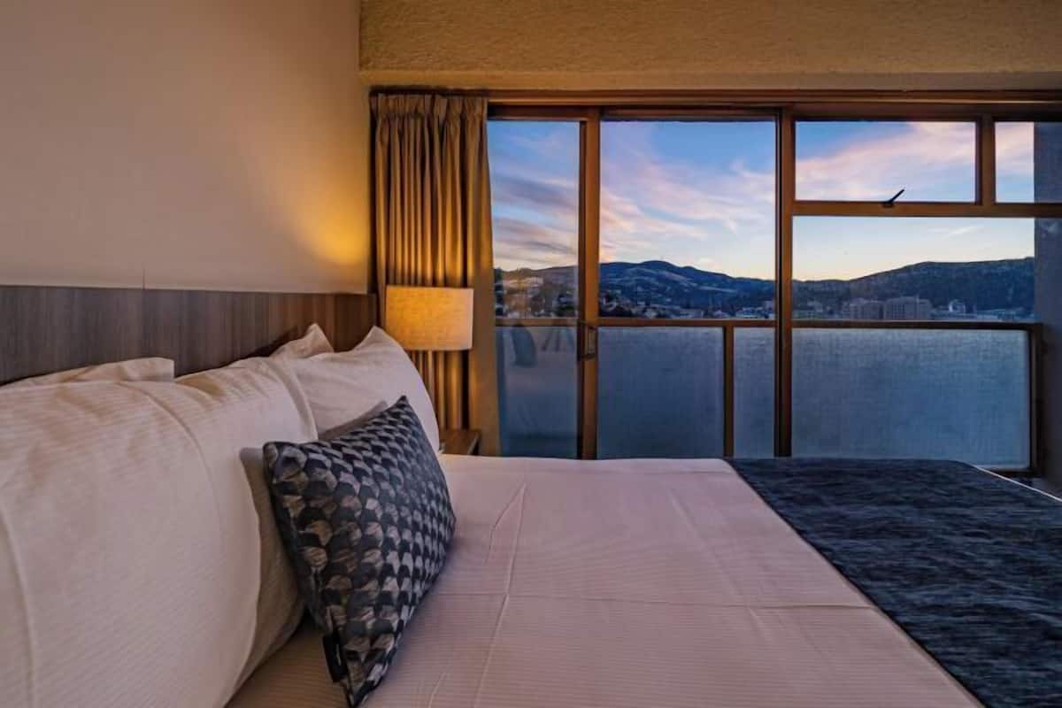 Premium bedding, blackout drapes, iron/ironing board, free WiFi