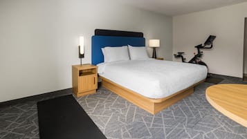 Down comforters, desk, blackout drapes, iron/ironing board