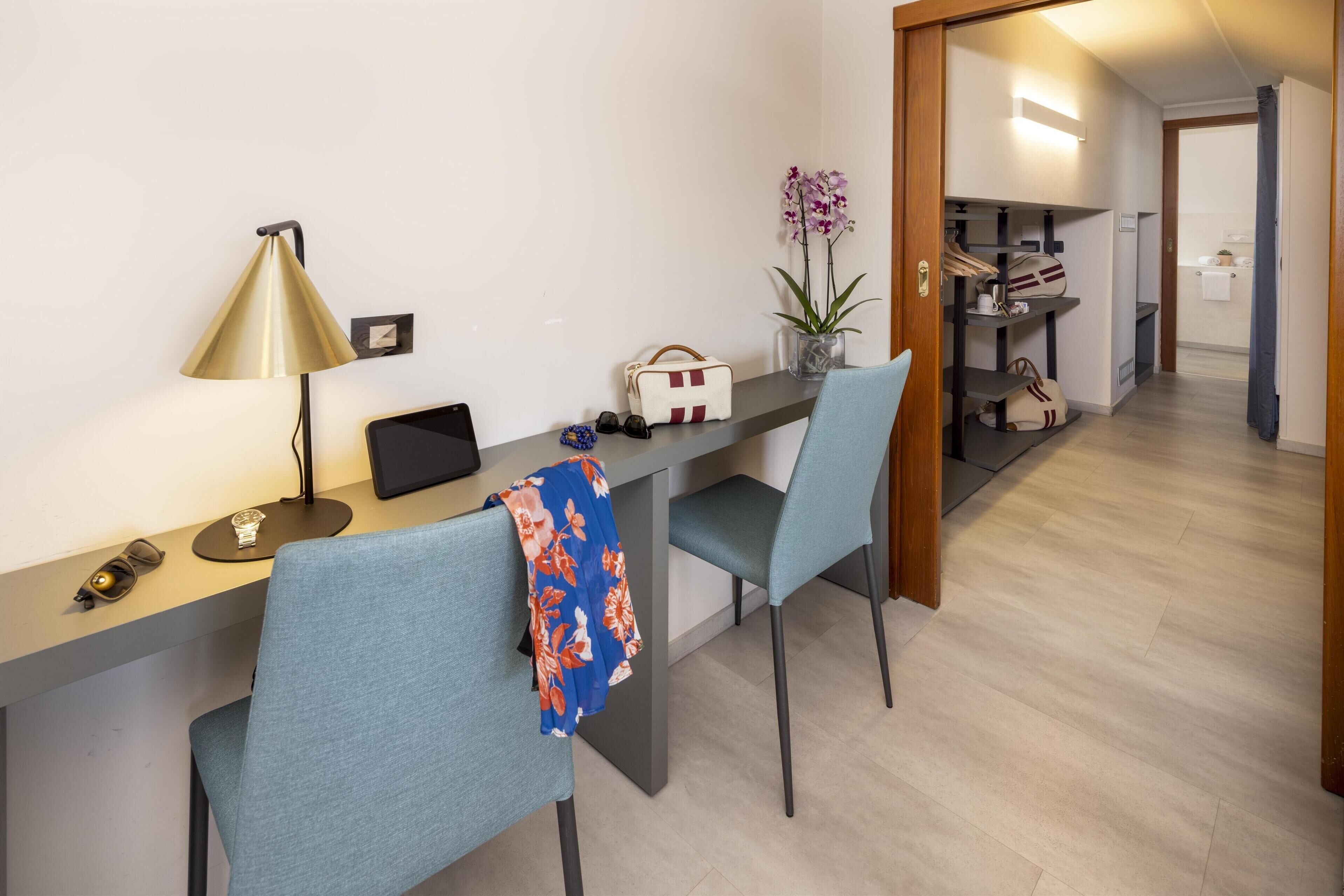 deluxe room, multiple beds, balcony, sea view | down duvets, minibar, in-room safe, desk