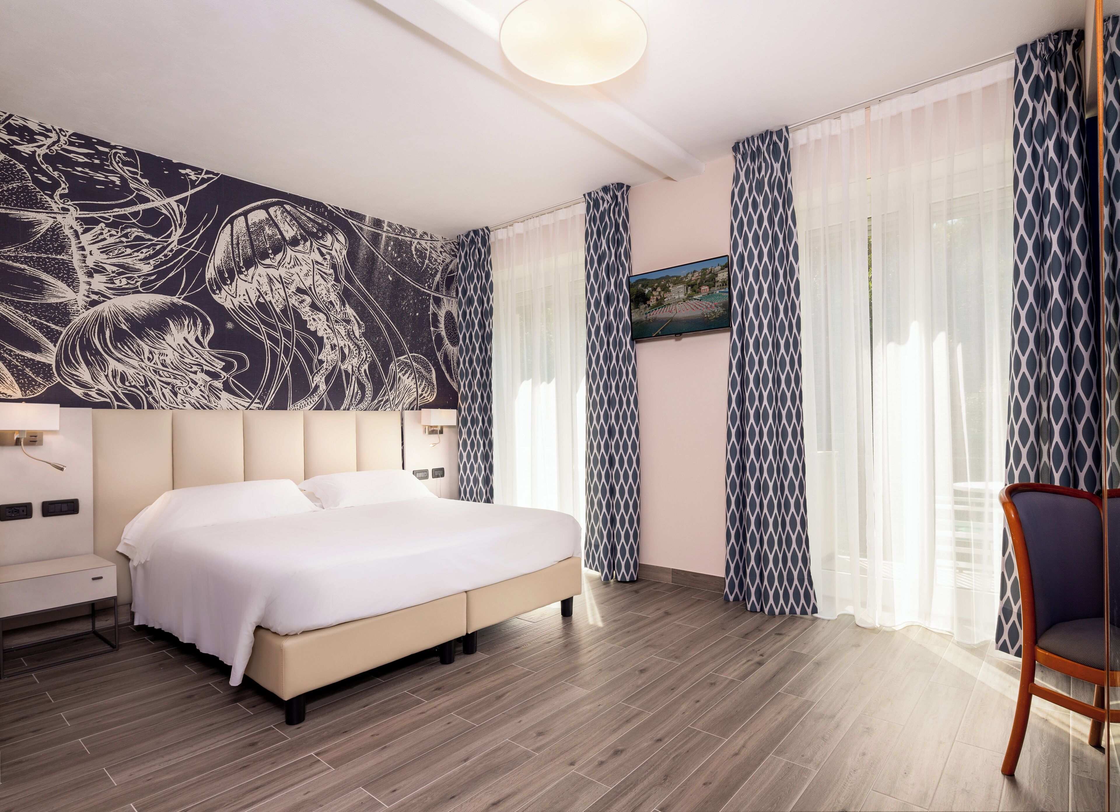 Standard Room, Multiple Beds, Balcony, Garden View | Down duvets, minibar, in-room safe, desk