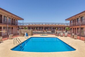 Outdoor pool, open 8:00 AM to 10 PM, pool umbrellas, pool loungers